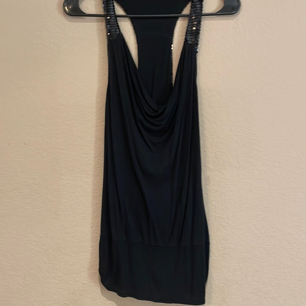 This is a medium sparkly (Guess) tank top blouse